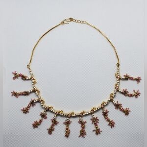 Elegant Gold and Pink Floral Necklace